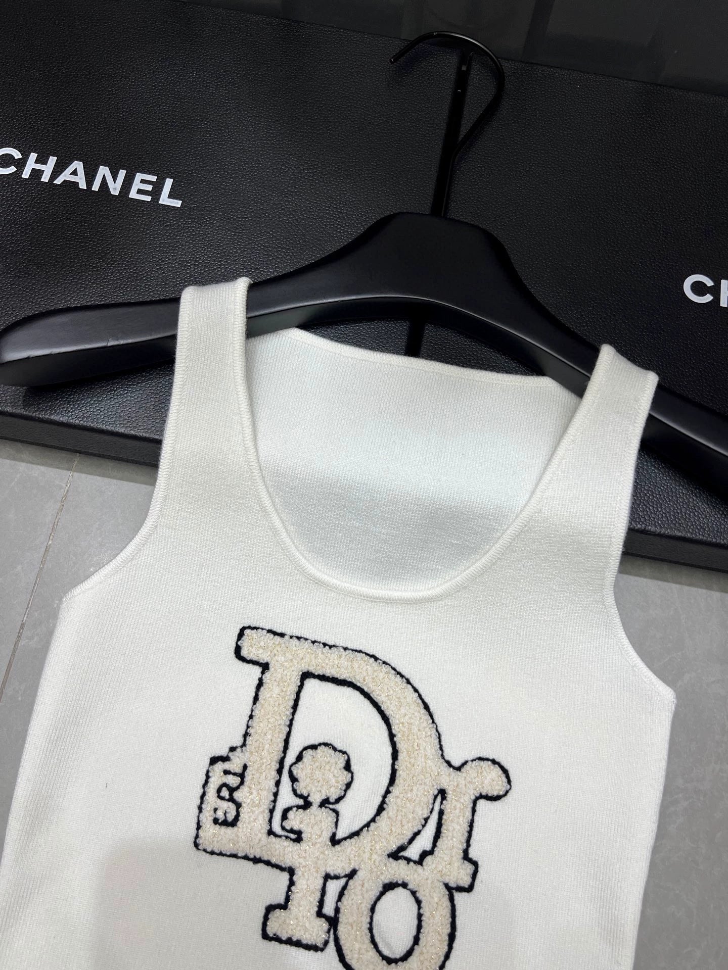 25 Flocked letter vest