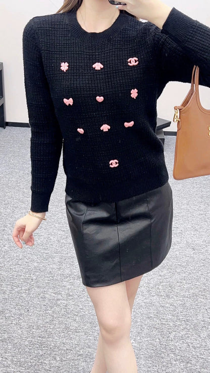 25 Back waist chain sweater