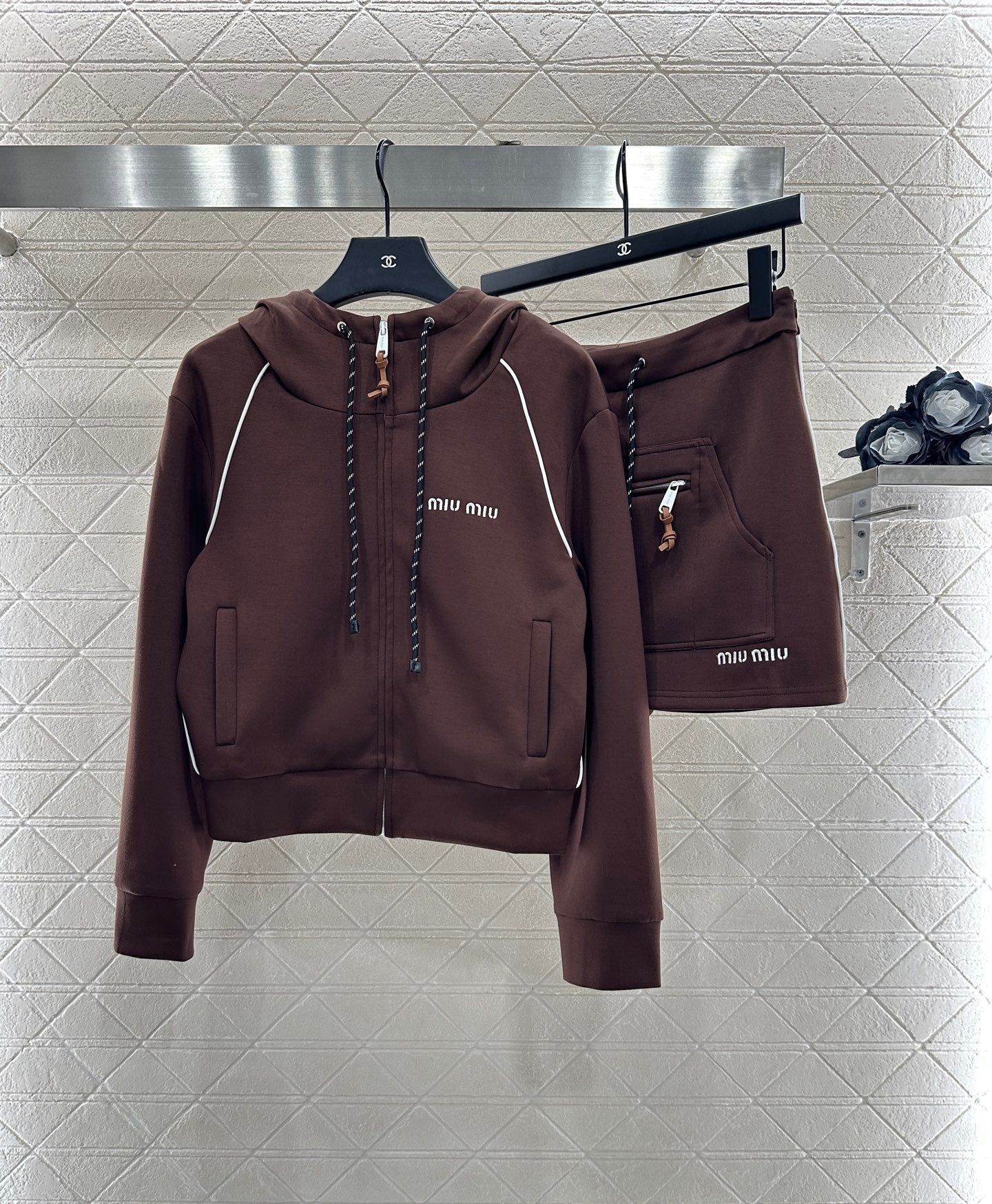 25 Hooded jacket and short skirt set
